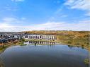 2407-42 Cranbrook Gardens Se, Calgary, AB  - Outdoor With Body Of Water With View 