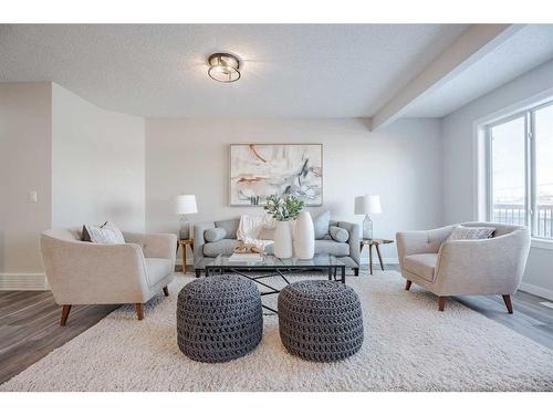 2046 Bridlemeadows Manor Sw, Calgary, AB - Indoor Photo Showing Living Room