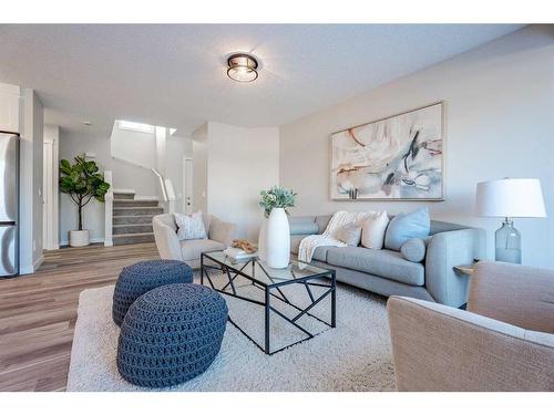 2046 Bridlemeadows Manor Sw, Calgary, AB - Indoor Photo Showing Living Room