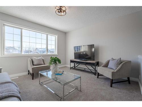 2046 Bridlemeadows Manor Sw, Calgary, AB - Indoor Photo Showing Living Room