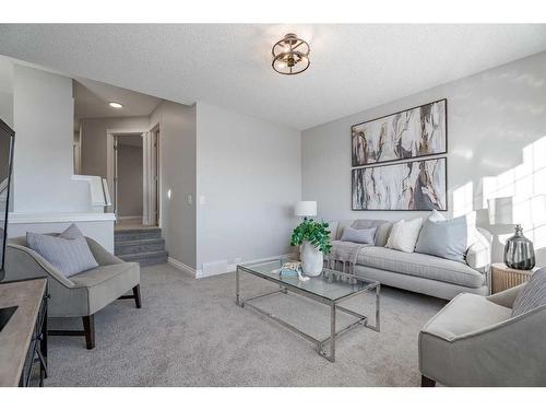 2046 Bridlemeadows Manor Sw, Calgary, AB - Indoor Photo Showing Living Room