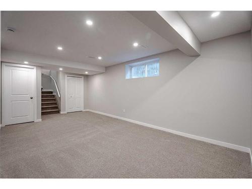 2046 Bridlemeadows Manor Sw, Calgary, AB - Indoor Photo Showing Basement