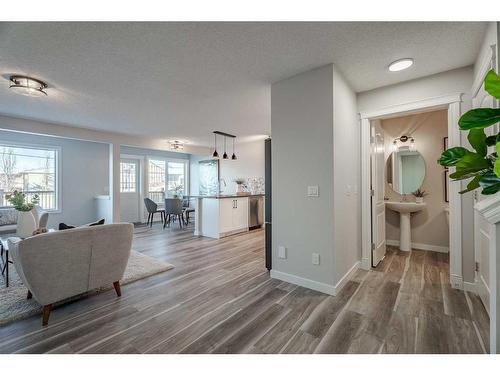 2046 Bridlemeadows Manor Sw, Calgary, AB - Indoor Photo Showing Living Room