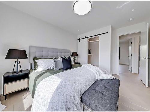 223 Parkside Way Se, Calgary, AB - Indoor Photo Showing Bedroom