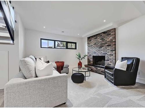 223 Parkside Way Se, Calgary, AB - Indoor Photo Showing Living Room With Fireplace