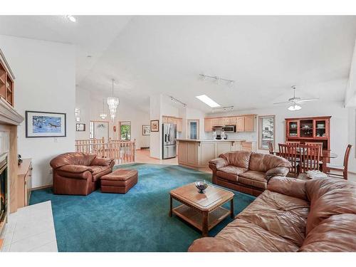 181 Hamptons Green Nw, Calgary, AB - Indoor Photo Showing Living Room With Fireplace