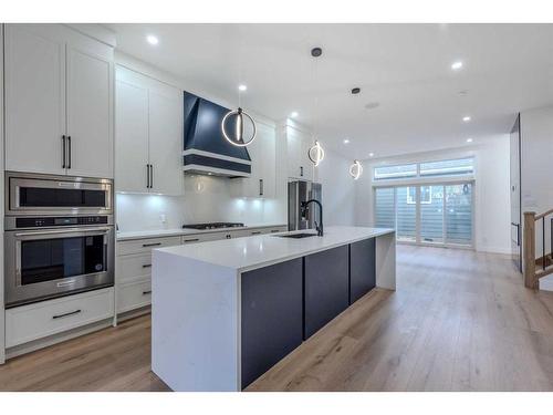 109 Hartford Road Nw, Calgary, AB - Indoor Photo Showing Kitchen With Upgraded Kitchen