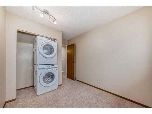 127 Sunmills Place Se, Calgary, AB - Indoor Photo Showing Laundry Room