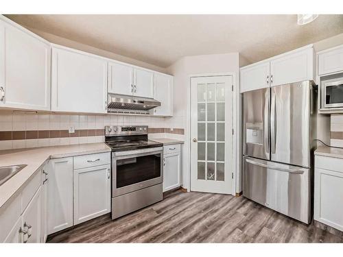 105 Coral Sands Terrace Ne, Calgary, AB - Indoor Photo Showing Kitchen With Stainless Steel Kitchen