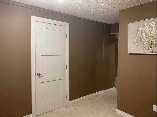 65 Shawnee Crescent Sw, Calgary, AB - Indoor Photo Showing Bedroom