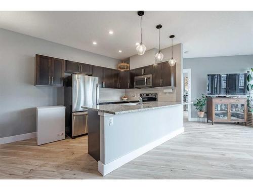 213-1899 45 Street Nw, Calgary, AB - Indoor Photo Showing Kitchen With Stainless Steel Kitchen With Upgraded Kitchen