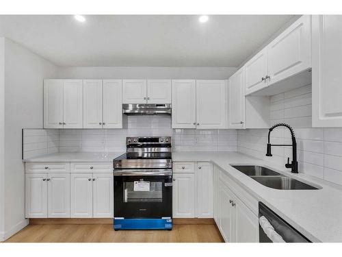 45-3705 Fonda Way Se, Calgary, AB - Indoor Photo Showing Kitchen With Double Sink