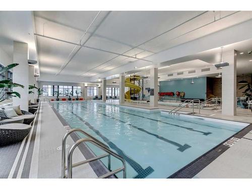 302-11 Mahogany Circle Se, Calgary, AB - Indoor Photo Showing Other Room With In Ground Pool