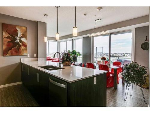 302-11 Mahogany Circle Se, Calgary, AB - Indoor Photo Showing Kitchen With Double Sink With Upgraded Kitchen