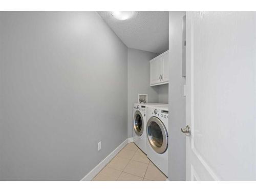 401-10 Sierra Morena Mews Sw, Calgary, AB - Indoor Photo Showing Laundry Room