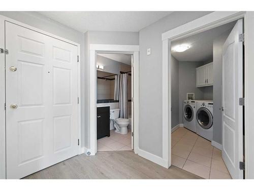 401-10 Sierra Morena Mews Sw, Calgary, AB - Indoor Photo Showing Laundry Room