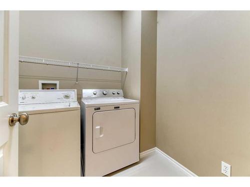 322 Cranfield Gardens Se, Calgary, AB - Indoor Photo Showing Laundry Room