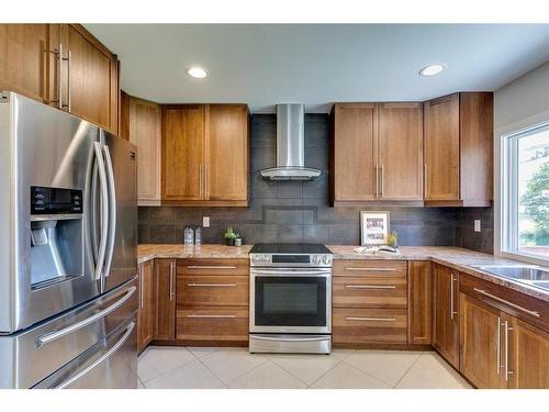 307 Simons Road Nw, Calgary, AB - Indoor Photo Showing Kitchen With Stainless Steel Kitchen