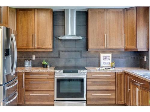 307 Simons Road Nw, Calgary, AB - Indoor Photo Showing Kitchen With Stainless Steel Kitchen