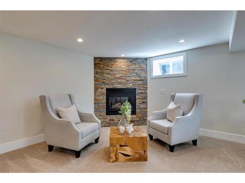 307 Simons Road Nw, Calgary, AB - Indoor With Fireplace