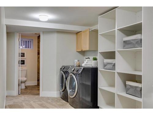 307 Simons Road Nw, Calgary, AB - Indoor Photo Showing Laundry Room