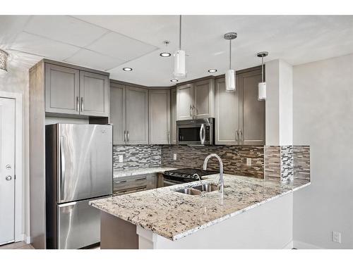 1206-16 Varsity Estates Circle Nw, Calgary, AB - Indoor Photo Showing Kitchen With Double Sink With Upgraded Kitchen