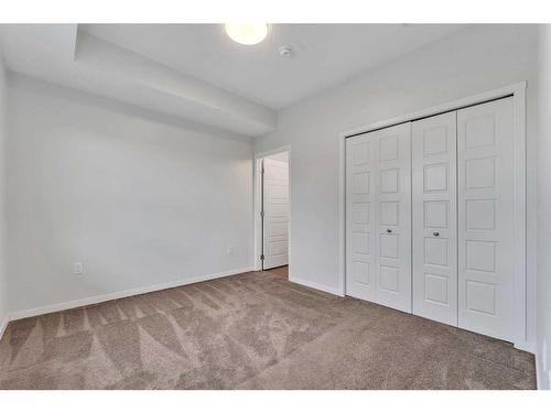 311-80 Carrington Plaza Nw, Calgary, AB - Indoor Photo Showing Other Room