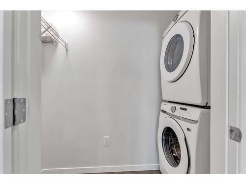 311-80 Carrington Plaza Nw, Calgary, AB - Indoor Photo Showing Laundry Room