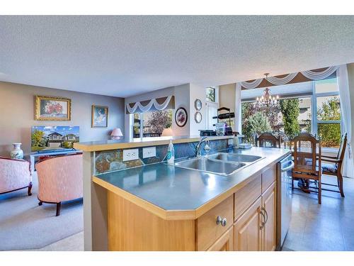 130 Valley Stream Circle Nw, Calgary, AB - Indoor Photo Showing Kitchen With Double Sink