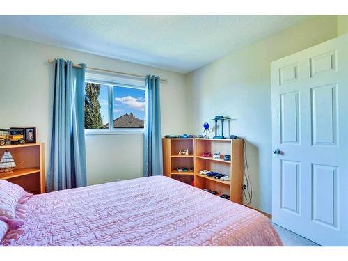 130 Valley Stream Circle Nw, Calgary, AB - Indoor Photo Showing Bedroom