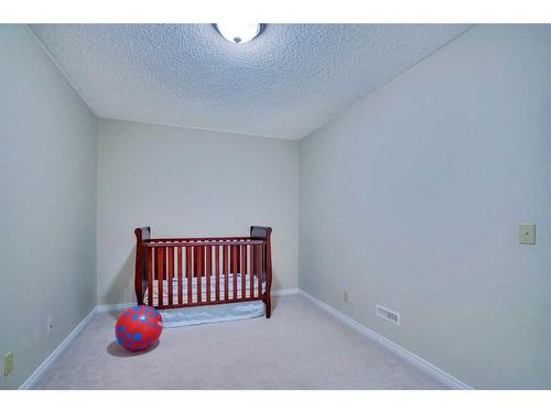 130 Valley Stream Circle Nw, Calgary, AB - Indoor Photo Showing Bedroom