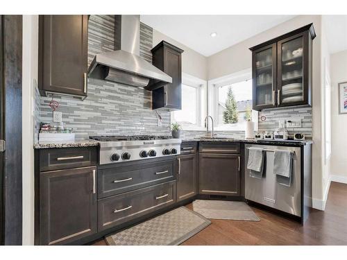 164 Rainbow Falls Heath, Chestermere, AB - Indoor Photo Showing Kitchen With Upgraded Kitchen