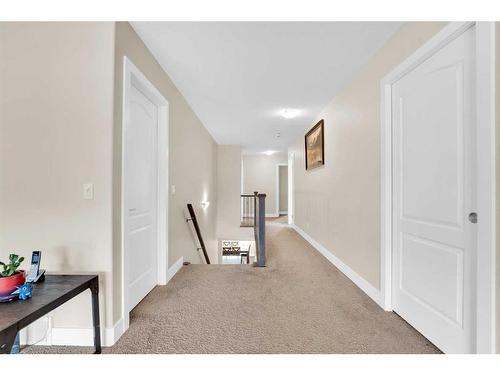 164 Rainbow Falls Heath, Chestermere, AB - Indoor Photo Showing Other Room