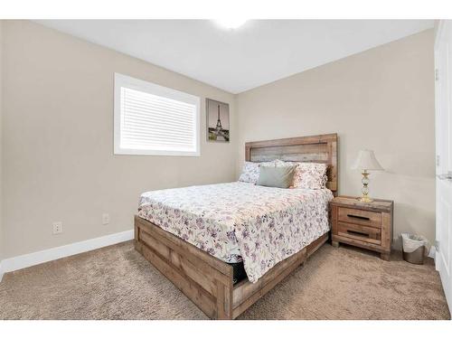 164 Rainbow Falls Heath, Chestermere, AB - Indoor Photo Showing Bedroom