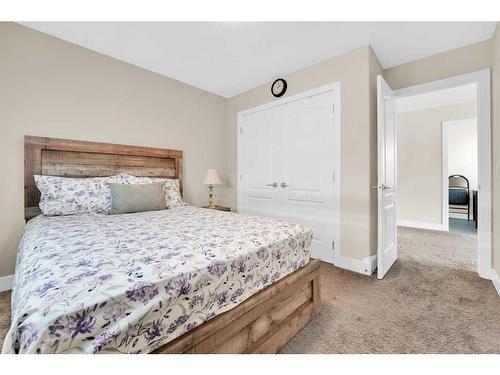 164 Rainbow Falls Heath, Chestermere, AB - Indoor Photo Showing Bedroom