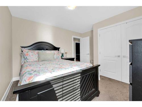 164 Rainbow Falls Heath, Chestermere, AB - Indoor Photo Showing Bedroom