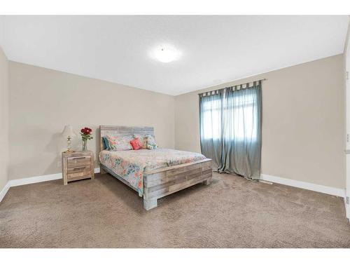 164 Rainbow Falls Heath, Chestermere, AB - Indoor Photo Showing Bedroom