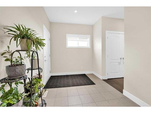 164 Rainbow Falls Heath, Chestermere, AB - Indoor Photo Showing Other Room