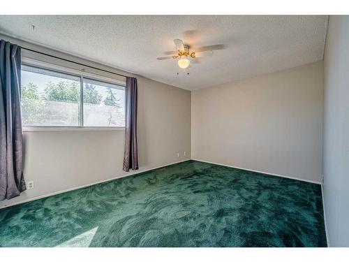 4 Edgedale Court Nw, Calgary, AB - Indoor Photo Showing Other Room