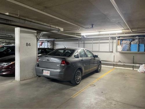 2328-604 East Lake Boulevard Ne, Airdrie, AB - Indoor Photo Showing Garage