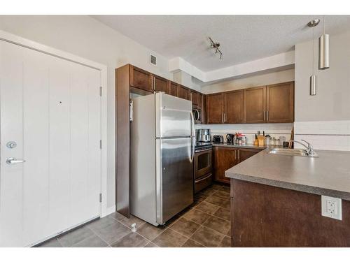 2328-604 East Lake Boulevard Ne, Airdrie, AB - Indoor Photo Showing Kitchen With Stainless Steel Kitchen