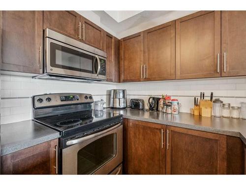 2328-604 East Lake Boulevard Ne, Airdrie, AB - Indoor Photo Showing Kitchen