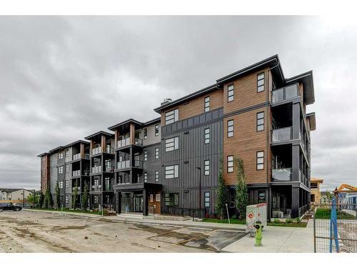 2310-55 Lucas Way Nw, Calgary, AB - Outdoor With Facade