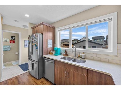 189 Legacy Crescent Se, Calgary, AB - Indoor Photo Showing Kitchen With Double Sink