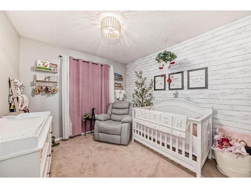 112 Mt Aberdeen Circle Se, Calgary, AB - Indoor Photo Showing Bedroom