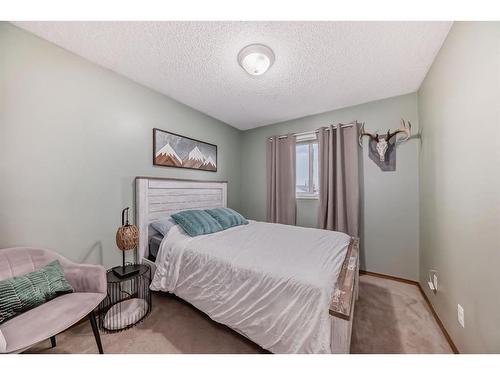 112 Mt Aberdeen Circle Se, Calgary, AB - Indoor Photo Showing Bedroom