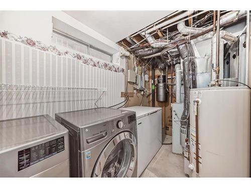 112 Mt Aberdeen Circle Se, Calgary, AB - Indoor Photo Showing Laundry Room