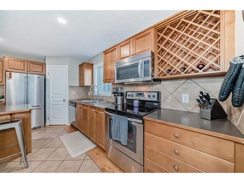 112 Mt Aberdeen Circle Se, Calgary, AB - Indoor Photo Showing Kitchen With Double Sink