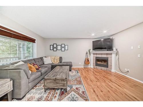 112 Mt Aberdeen Circle Se, Calgary, AB - Indoor Photo Showing Living Room With Fireplace