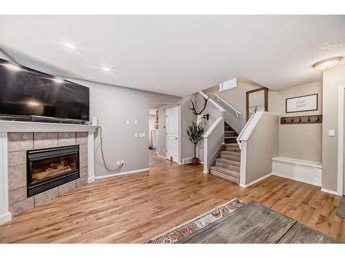 112 Mt Aberdeen Circle Se, Calgary, AB - Indoor With Fireplace